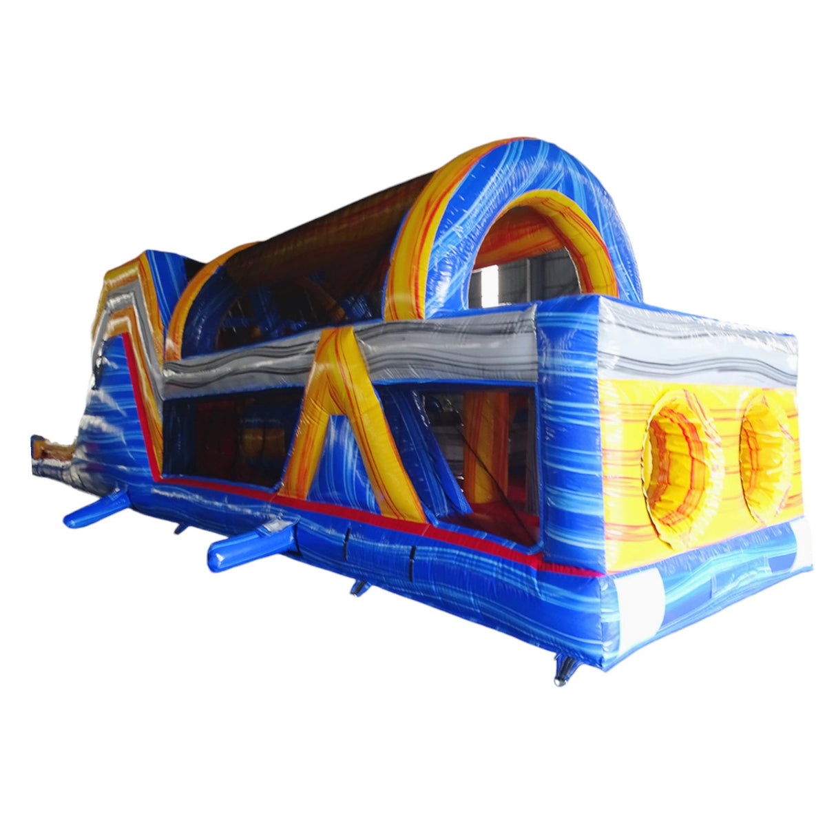 Close-up view of 53ft XL Rip Curl Commercial Hybrid Inflatable Obstacle Course entrance area. Features a blue and yellow color scheme with red accents, dual circular entrances, and a large arched top. The inflatable is set against a white background, showcasing its design details for commercial use.