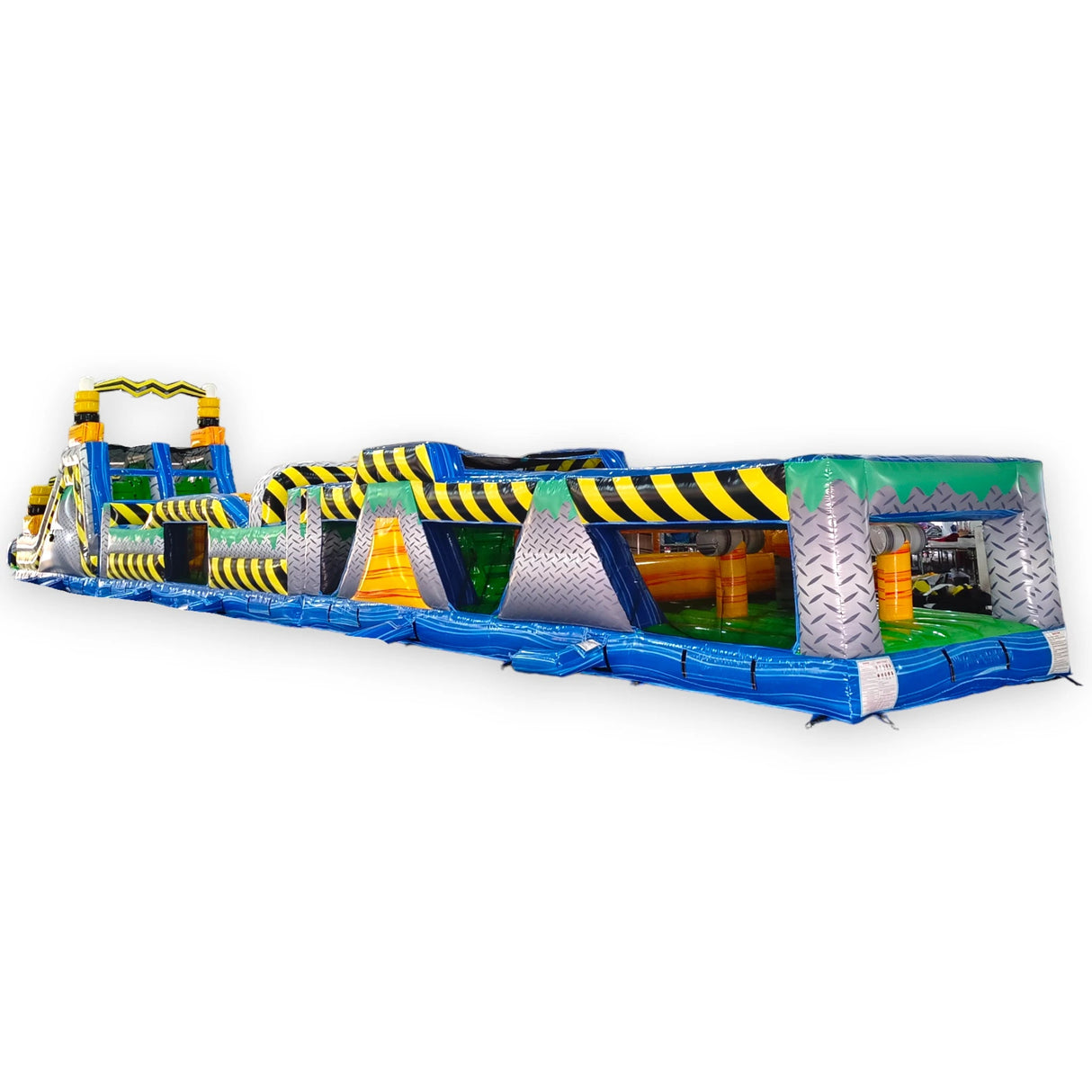 92ft Radioactive Run 3-Piece Wet/Dry Inflatable Obstacle Course featuring yellow and black hazard stripes, multiple obstacles, and blue base in warehouse setting