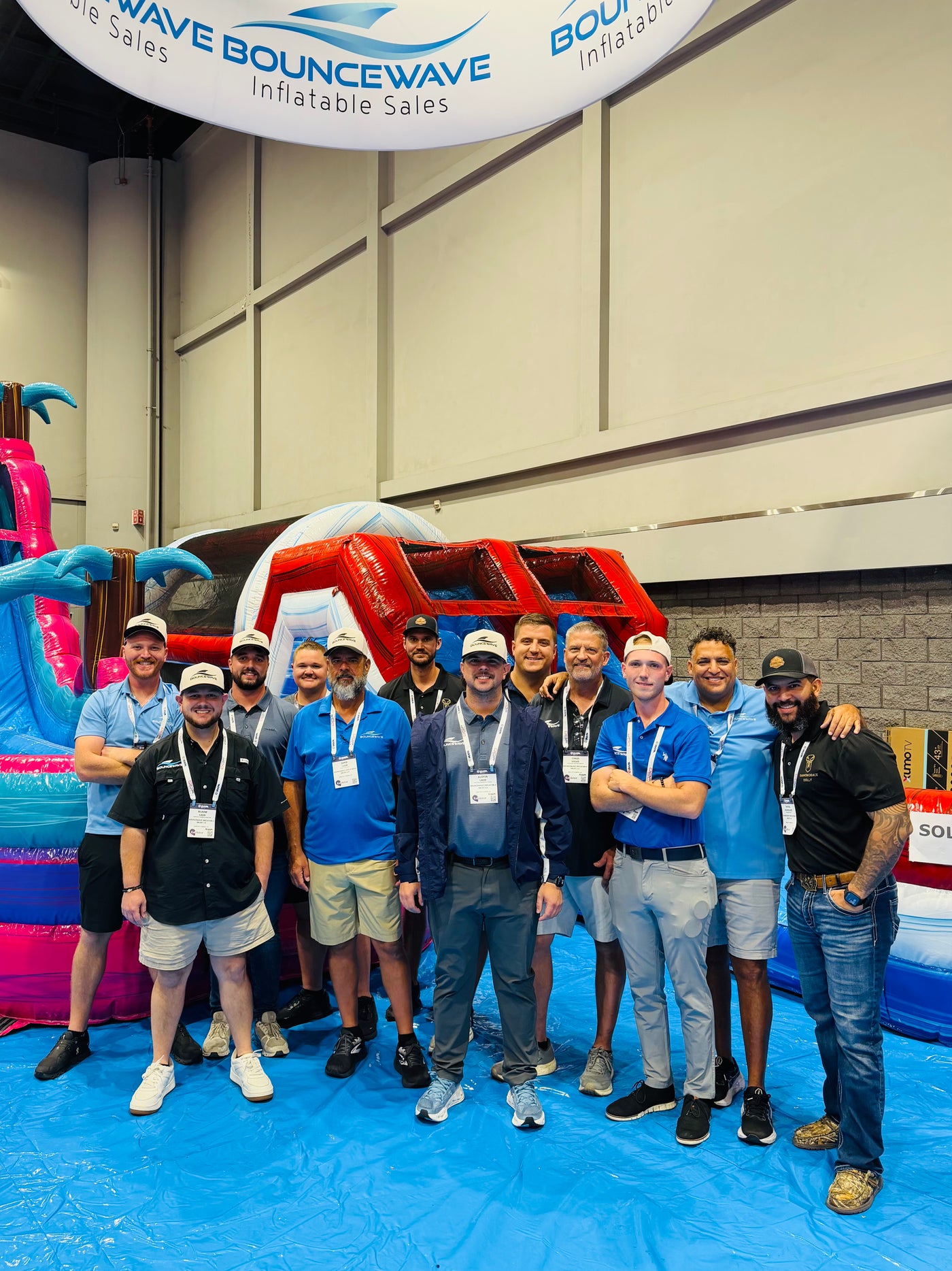 The BounceWave inflatable sales team at the 2025 IAAPA Expo