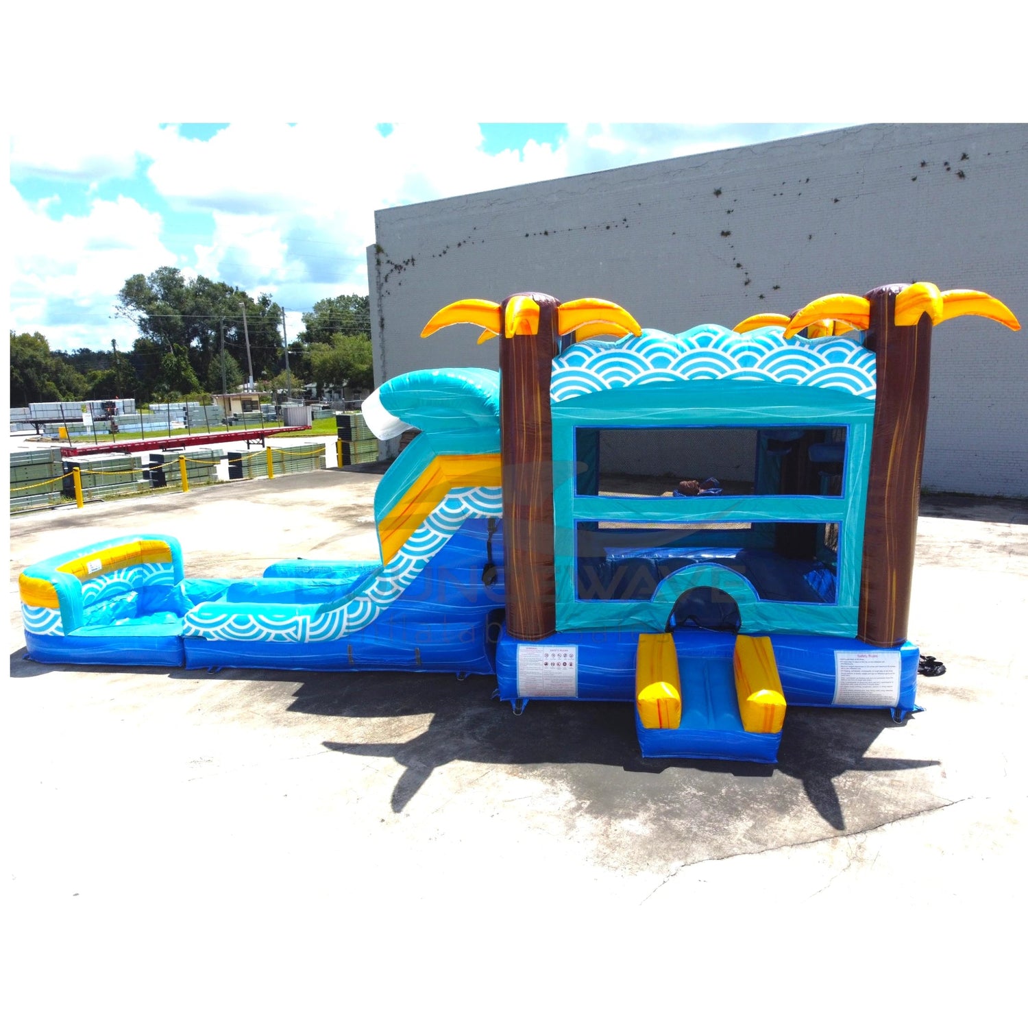 Akua Falls Dual Lane Bounce House with Slide (Wet/Dry) - BounceWave Inflatable Sales