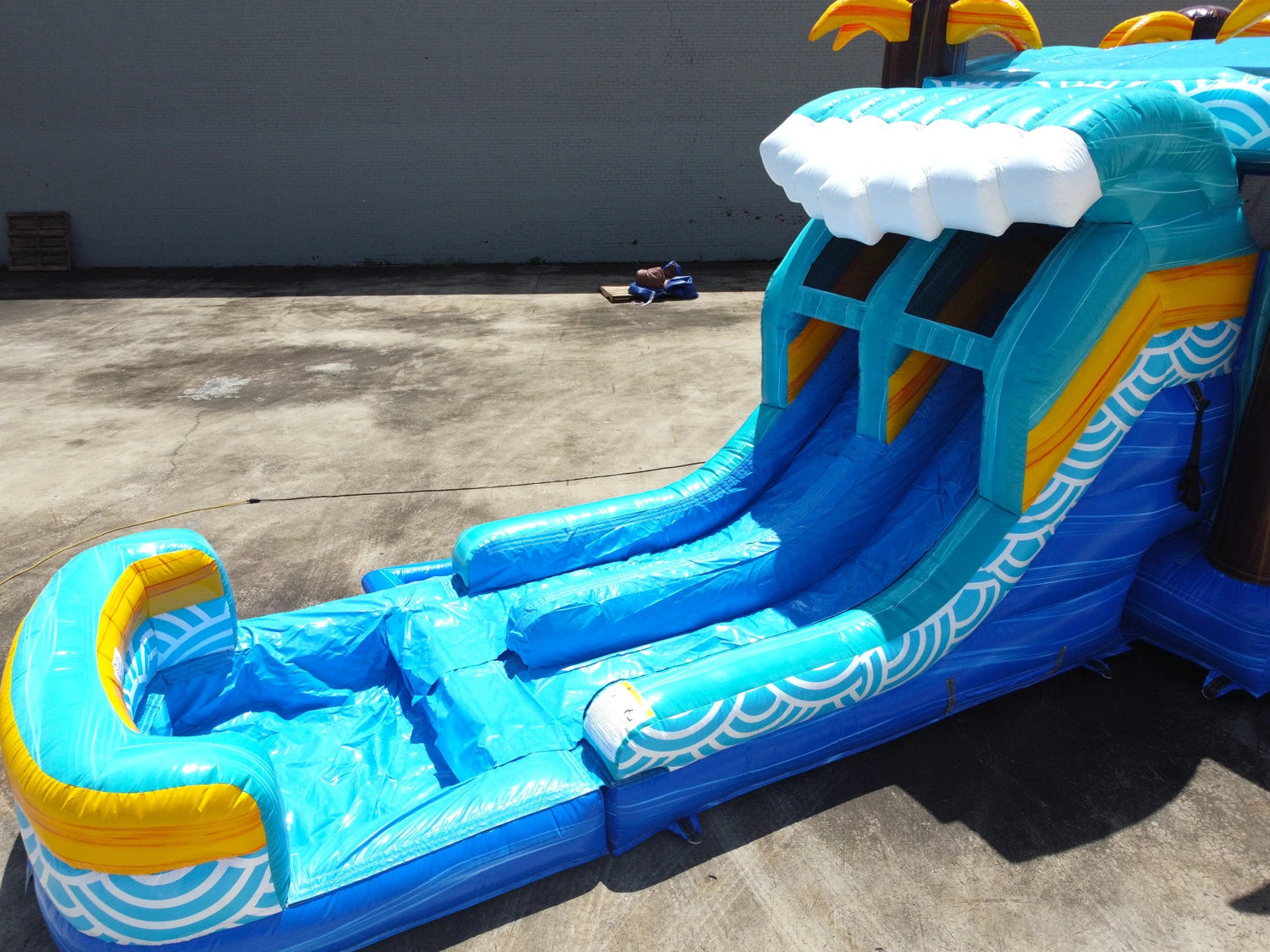Akua Falls Dual Lane Bounce House with Slide (Wet/Dry) - BounceWave Inflatable Sales