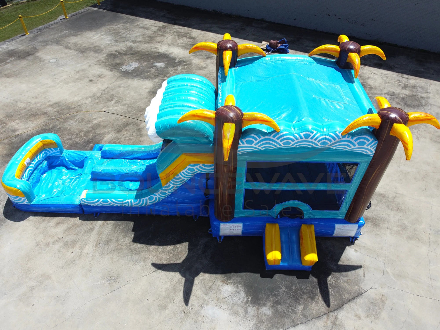 Akua Falls Dual Lane Bounce House with Slide (Wet/Dry) - BounceWave Inflatable Sales