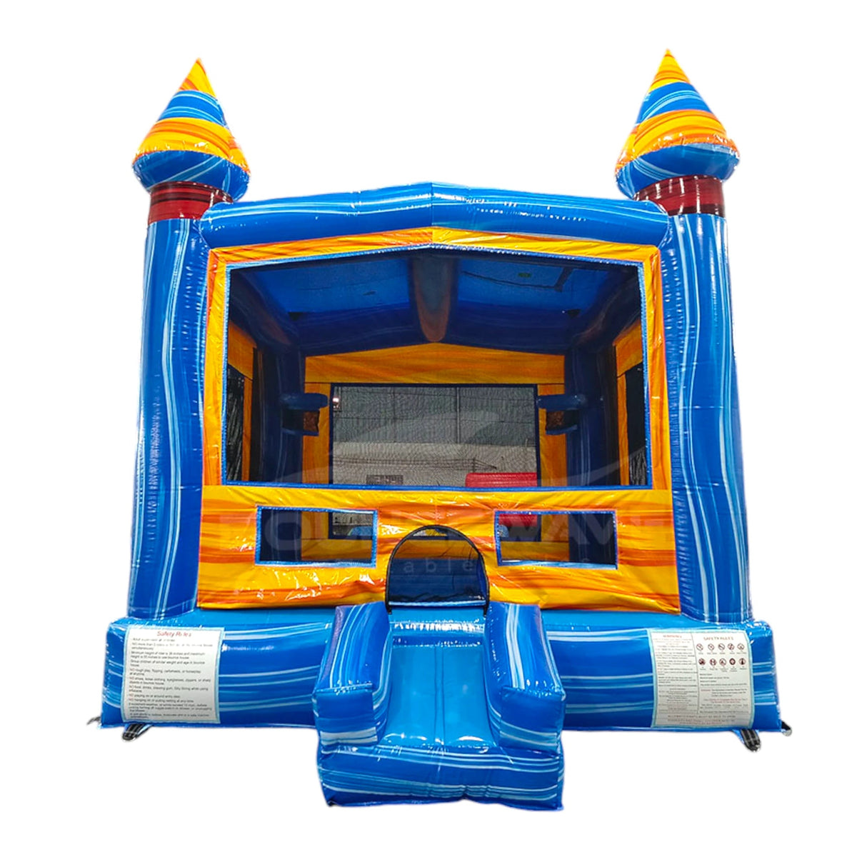 Fire and Ice Commercial Grade Bounce House front view with blue base, yellow walls, and colorful spiral turrets