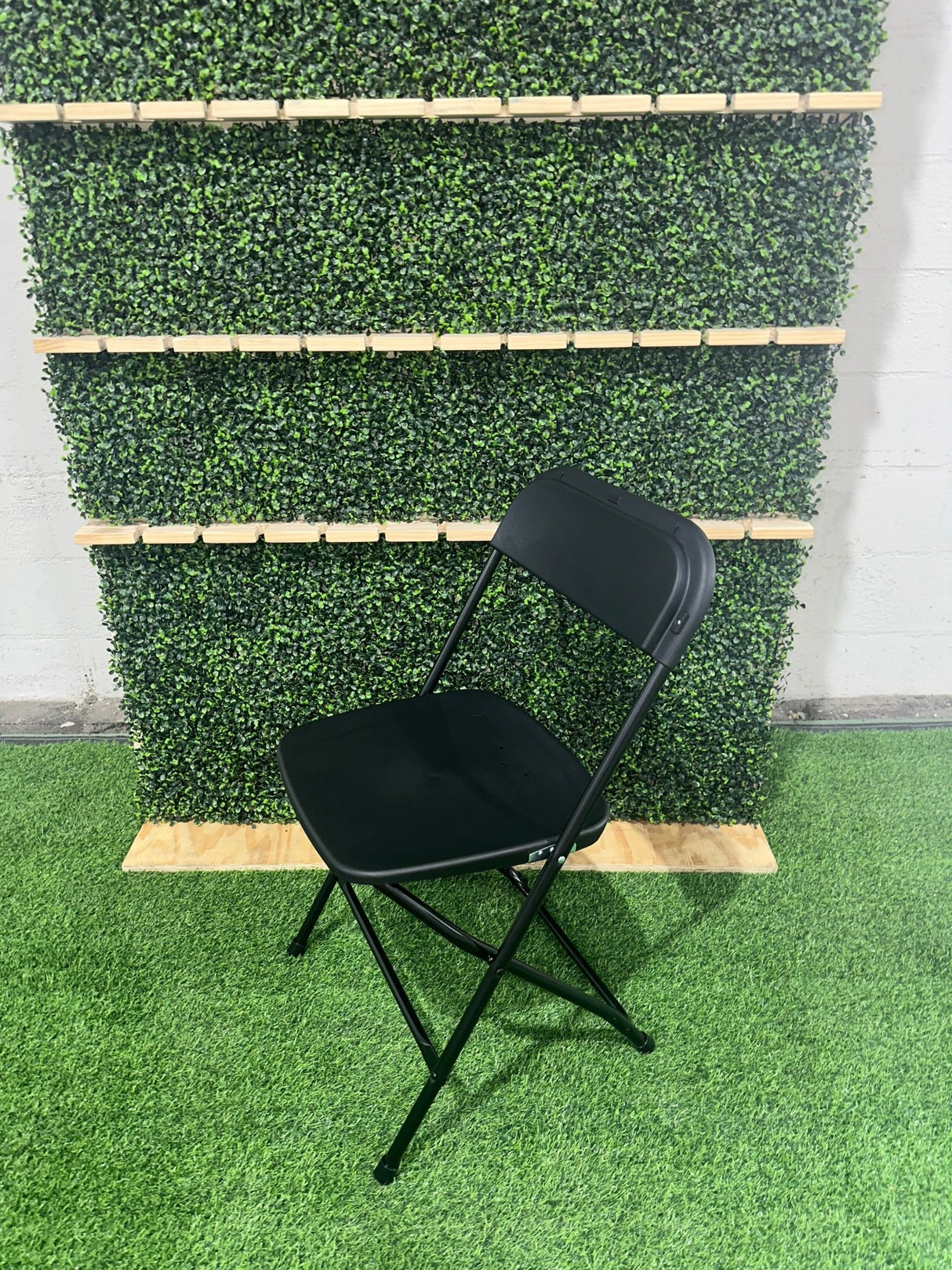 Heavy Duty Black Plastic Folding Chair - BounceWave Inflatable Sales