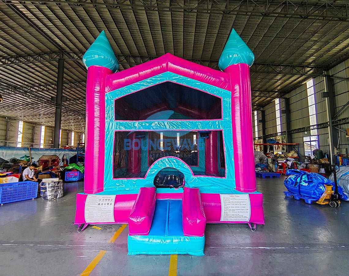 Pink/Teal Castle Bounce House - BounceWave Inflatable Sales