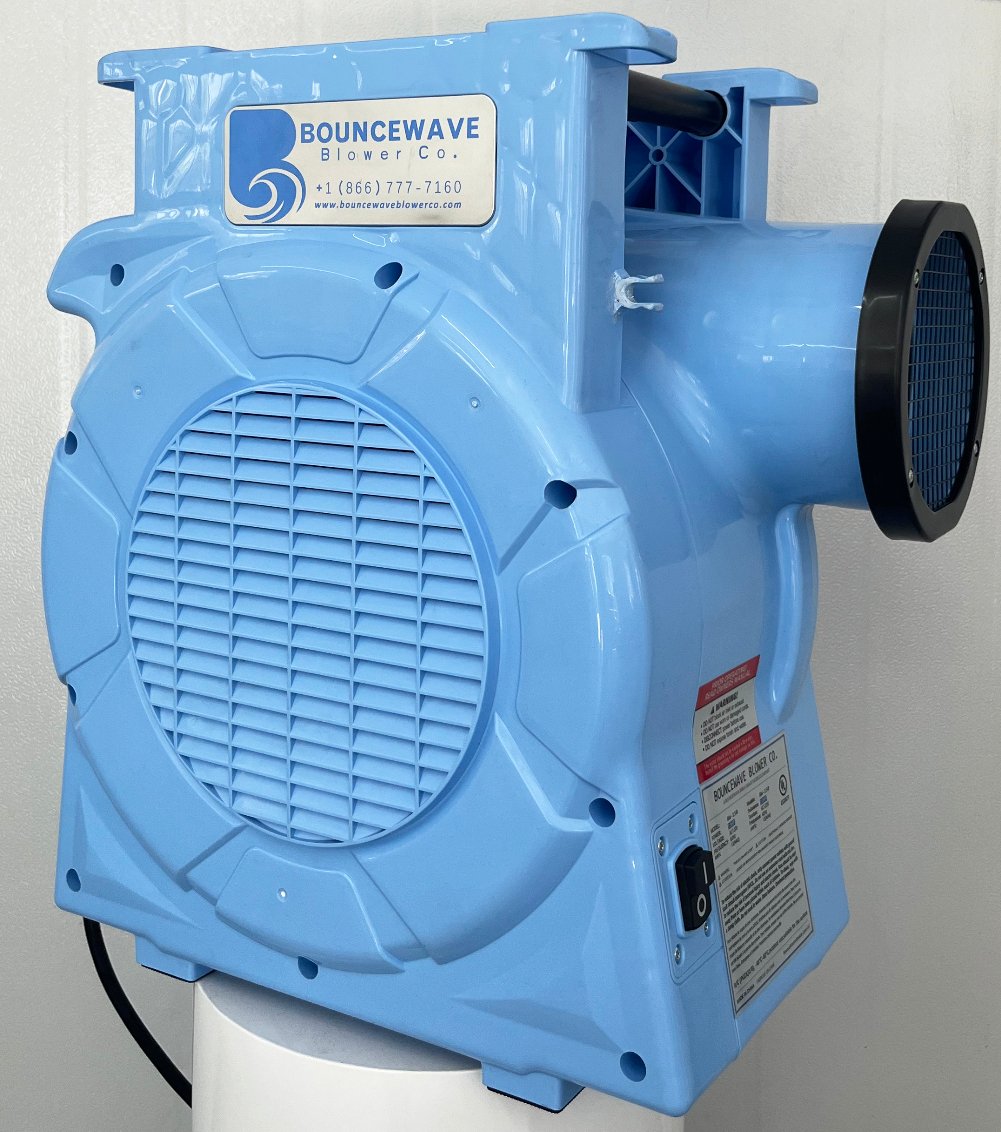 1.5hp BounceWave Air Pump for Inflatables side angle view displaying light blue body, dual air outlets, product label, and power cord in indoor setting