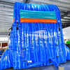 Rear view of Hammerhead Reef inflatable water slide, displaying tall blue structure with shark silhouette and climbing area.