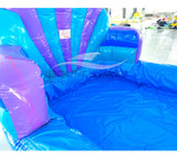 close-up view of Mermaid's Cove inflatable water slide displaying vibrant blue and purple design with shell-shaped top and large splash area.