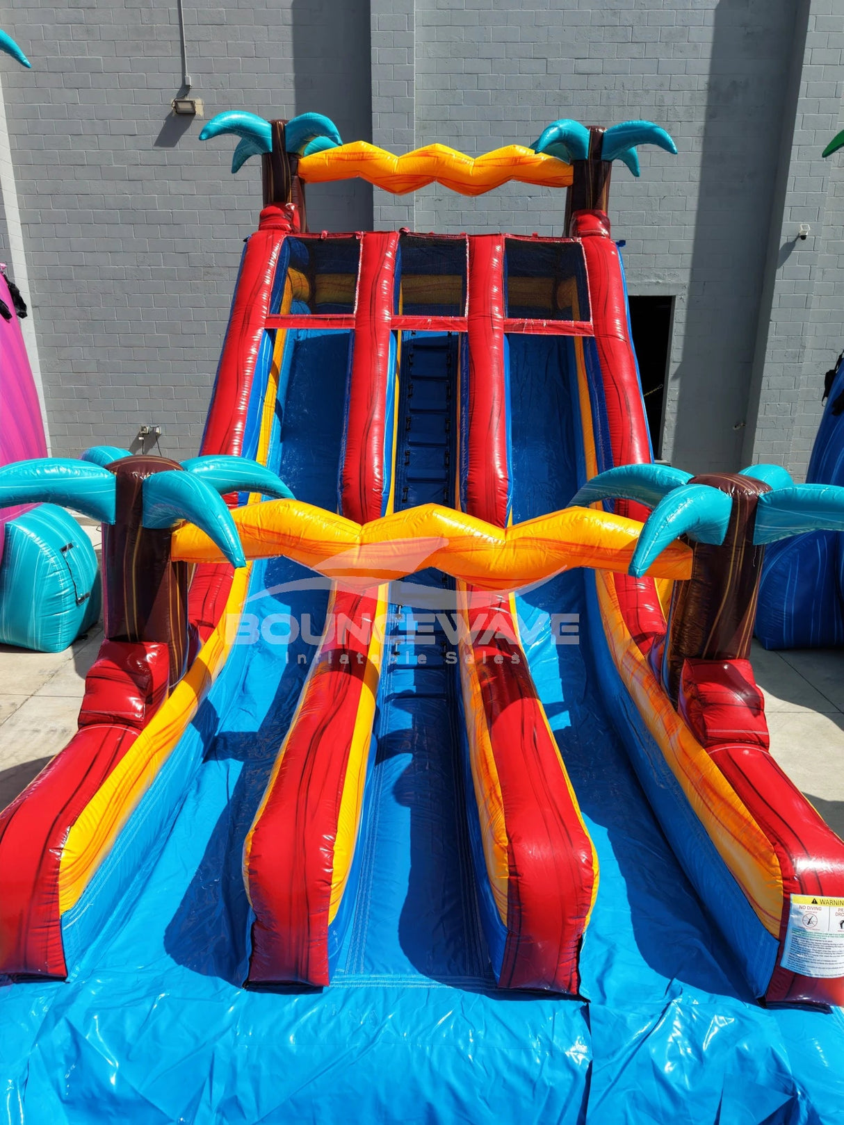 18ft Riptide Dual Lane Water Slide – Center Climb - BounceWave Inflatable Sales