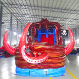 Front view of Tentacle Typhoon inflatable water slide displaying red octopus head, blue sliding lanes, brown ship base, and large tentacles wrapping around the structure.