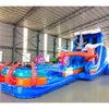 Side view of 20ft Hammerhead Reef Hybrid DL water slide showing vibrant blue colors, inflatable shark figures, octopus tentacles, and a large splash pool area. The slide features both open and enclosed sliding sections, displayed in an indoor facility with other inflatables visible.