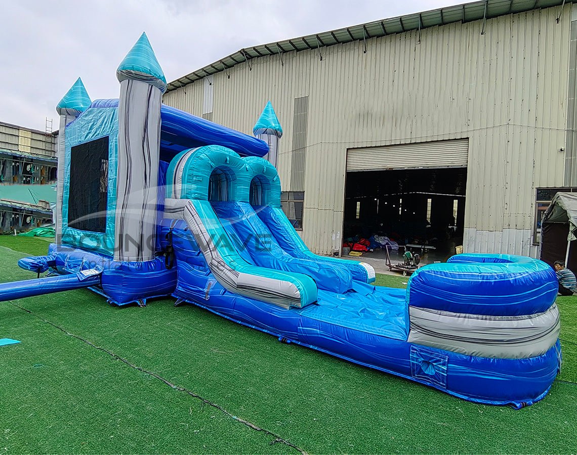 Bahama Blast PowerPlay Dual Lane Bounce House with Slide Combo - BounceWave Inflatable Sales