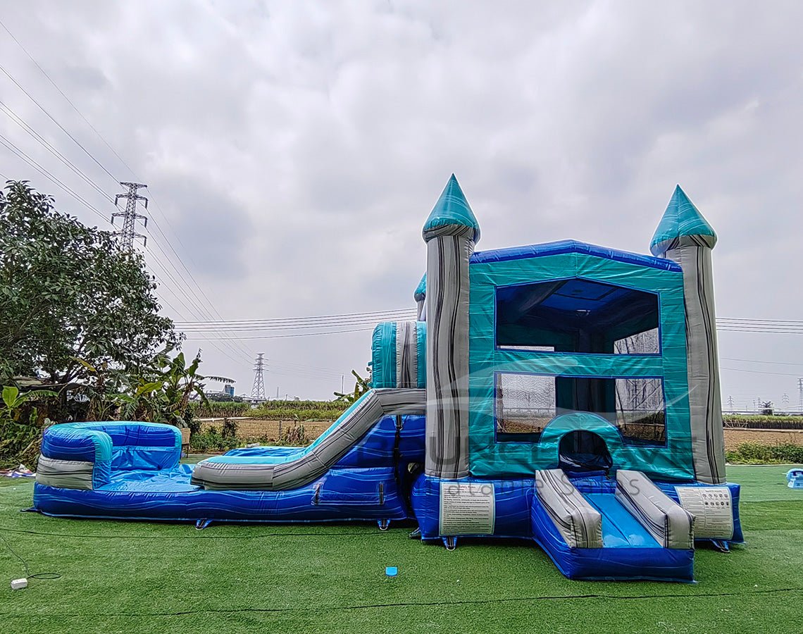 Bahama Blast PowerPlay Dual Lane Bounce House with Slide Combo - BounceWave Inflatable Sales