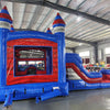 Castle-themed inflatable combo with bounce house, slide, and splash pool. Decorated with blue walls, red turrets, and mesh windows. Displayed in an indoor facility with various other inflatable products and equipment visible.