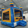 Fire and Ice Commercial Grade Bounce House side angle view displaying blue base, yellow walls, and multicolored spiral turrets
