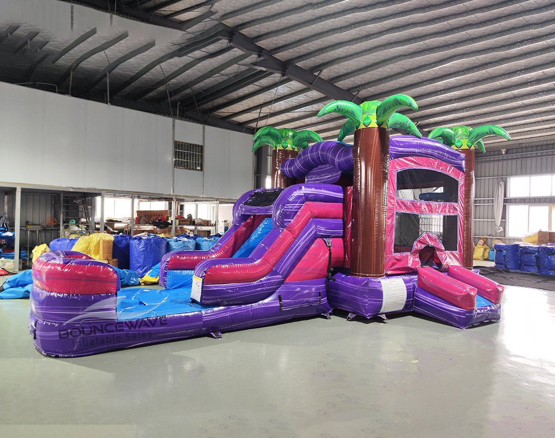 Purple Palace Palms Commercial Bounce House Combo with Slide (Wet/Dry) - BounceWave Inflatable Sales