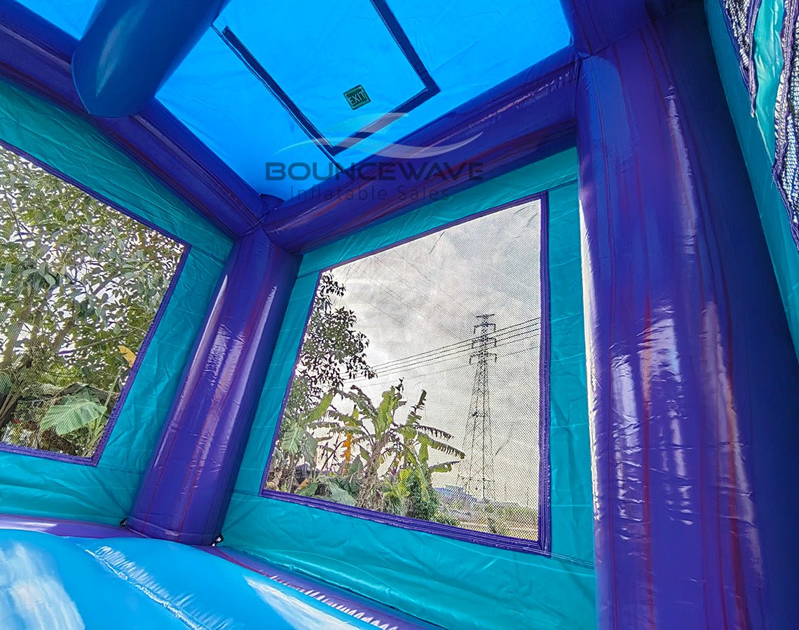 Purple Plunge PowerPlay Dual Lane Bounce House with Slide Combo - BounceWave Inflatable Sales